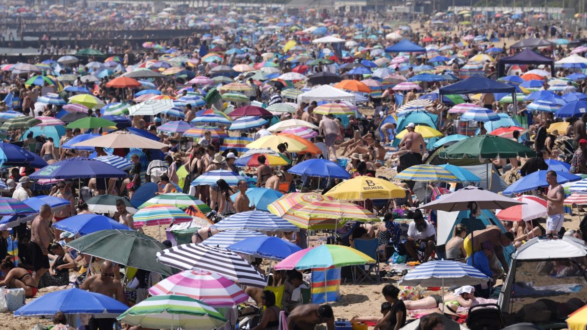 People enjoy the hot weather on Bournemouth beach in Dorset./ppMonday is set to be the hottest bank Holiday on record, reaching 